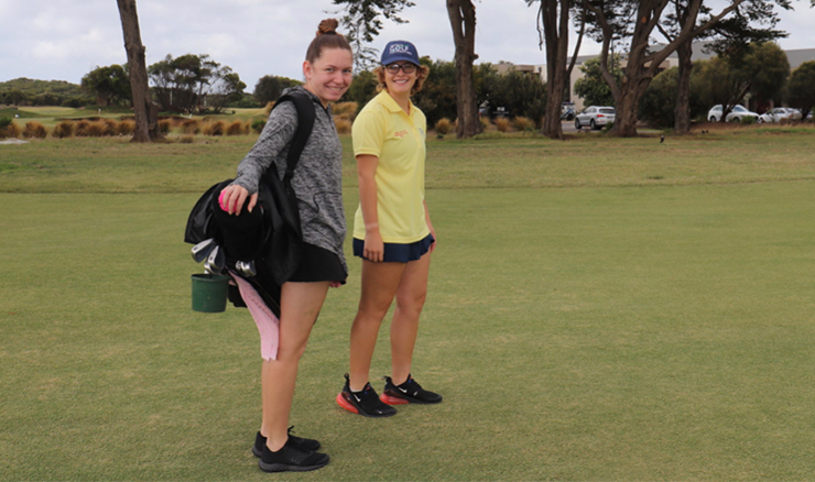 Olivia caddying for Mae at the 2022 Vic Open.