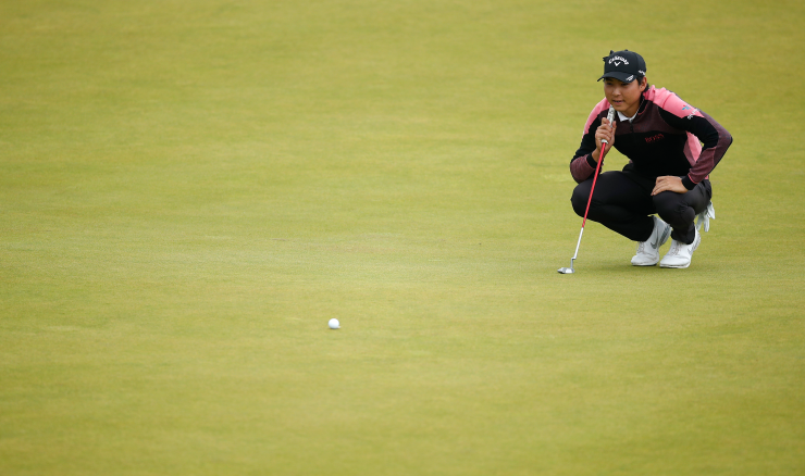 Min Woo Lee lines up a putt during the final round of his victory at the Scottish Open.