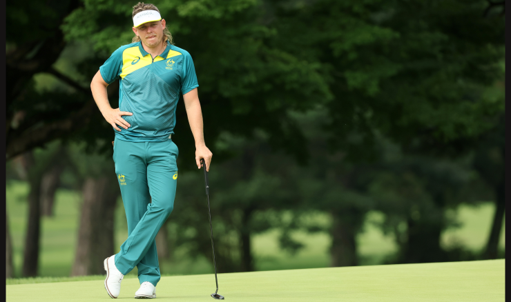 Cam Smith leans on his putter during round 2 of Tokyo 2020.