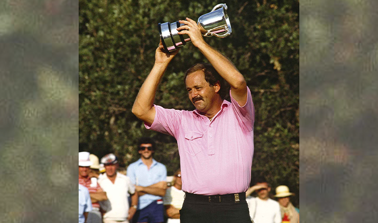 Bob Shearer lifting the Stonehaven Cup aloft.