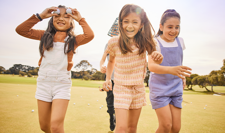 Girls enjoying golf.