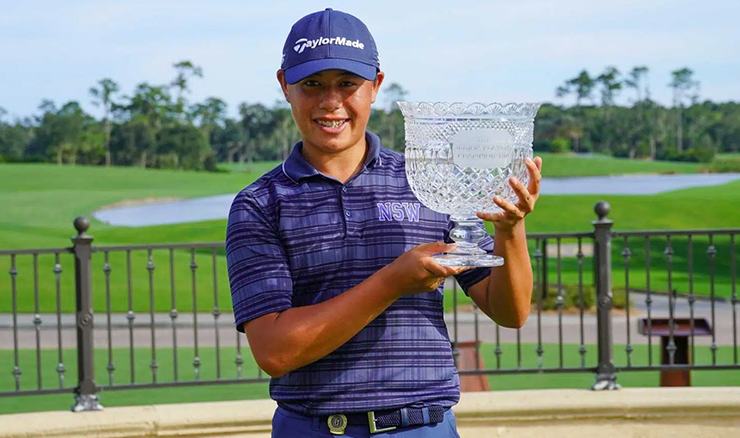 Jeffrey Guan with the Junior Players trophy.