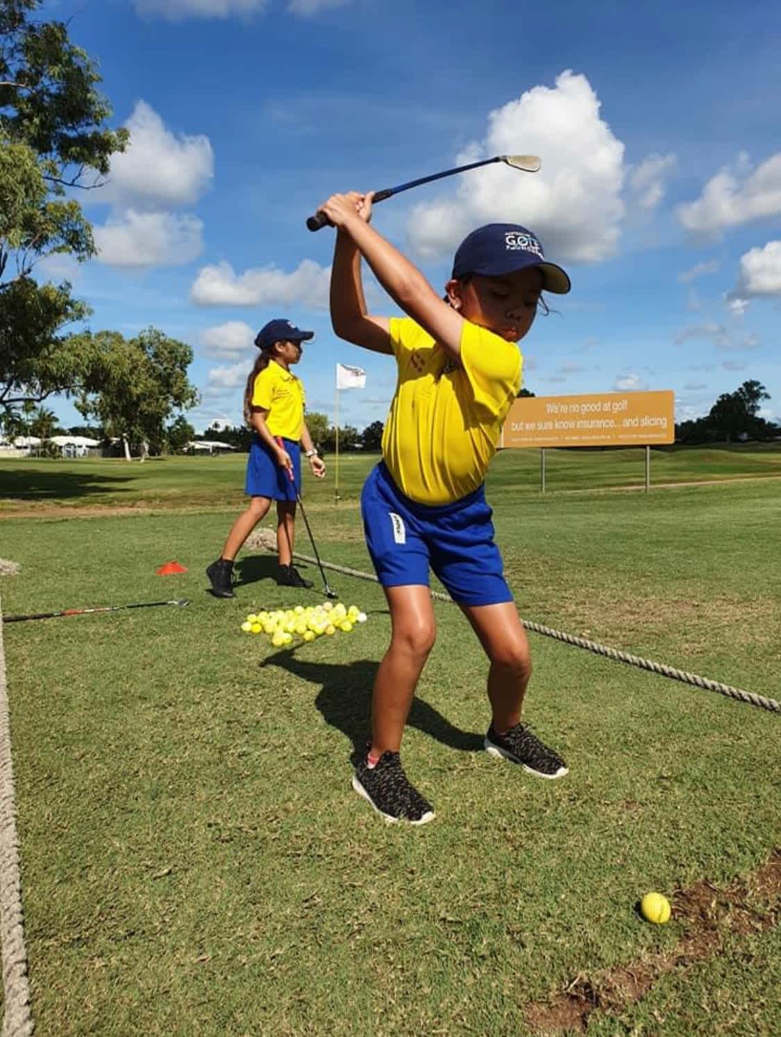 Pictured: 11-year-old Summer Dellow lowering her handicap.