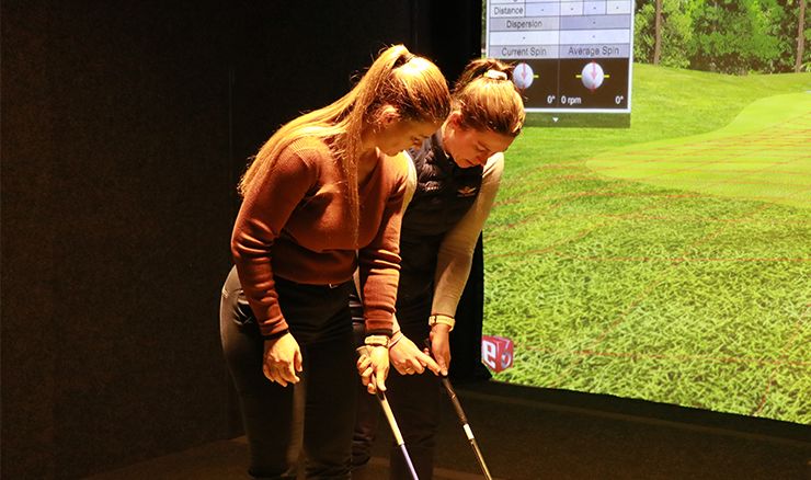 PGA Professional Jade Shellback runs a clinic as part of Women's Golf Day.