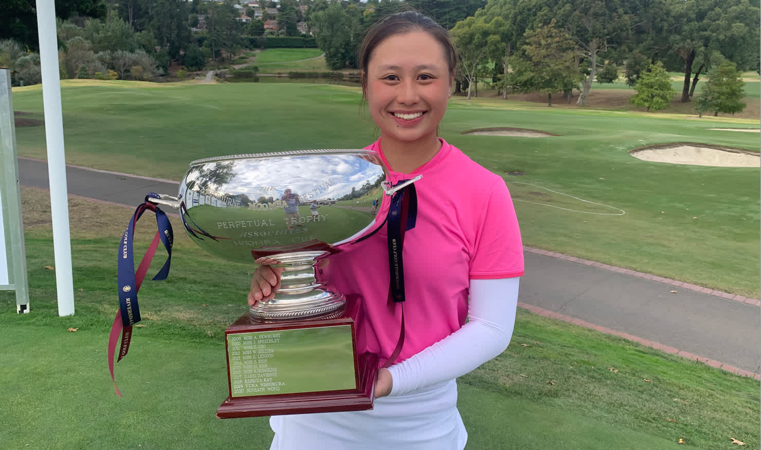 Jeneath Wong gets her hands back on the Riversdale Cup trophy.