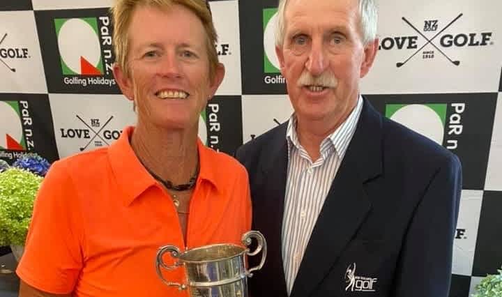 Jacqui Morgan with Golf NZ Life Member Mike Alexander.