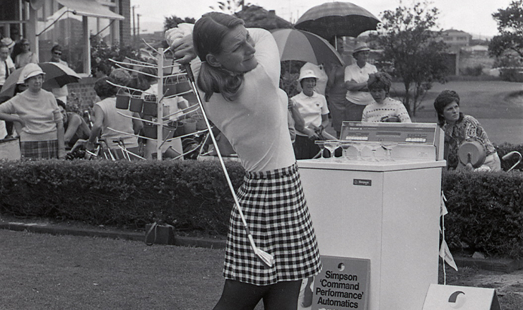 Barbara McHutchinson hits the first ball in Australia's first-ever women's professional tournament.