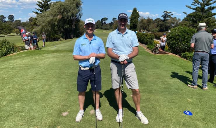 Matt Griffin and Geoff Ogilvy on the first tee at Cheltenham Golf Club.