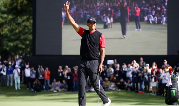 Tiger Woods celebrates his winning putt today. Image: Getty