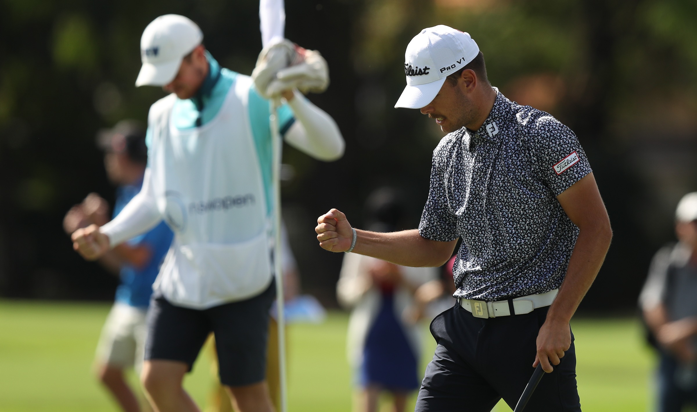Nathan Barbieri and caddie Jordie Garner celebrate during round three of the NSW Open. Photo: Brett Costello