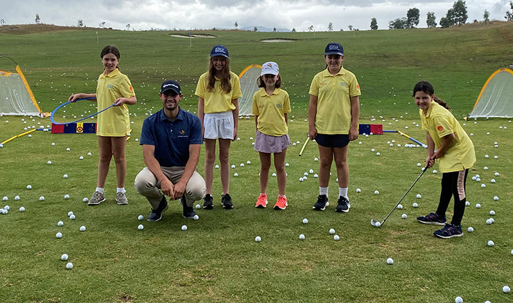 PGA Professional Jake Fullerton with the 2022 Australian Golf Foundation scholarship recipients at Eastern Golf Club.