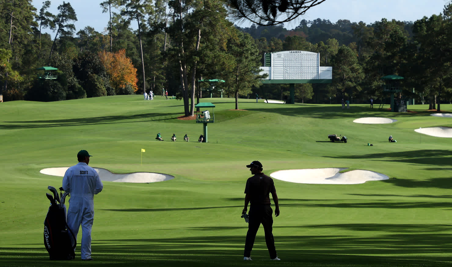 Adam Scott tries to learn the nuances of Augusta National's second hole today with no galleries and shade-covered fairway.