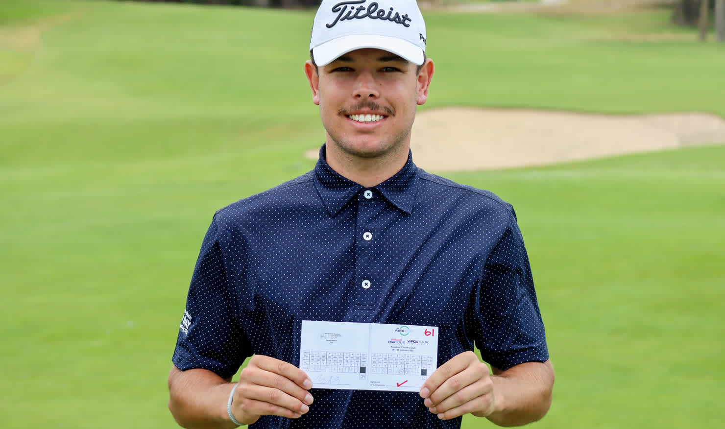 Nathan Barbieri shows off the card of his new course record at Rosebud. Picture: PGA of AUSTRALIA
