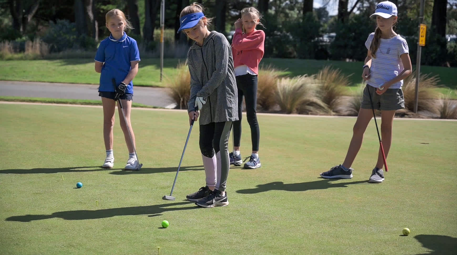 Girls putting at 13th Beach MyGolf Girls clinic