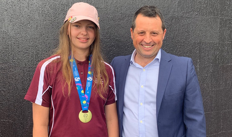 Natascha Tennent, with her National Games gold medal, and Christian Hamilton, Golf Australia's Senior Manager - Programs & Inclusion.