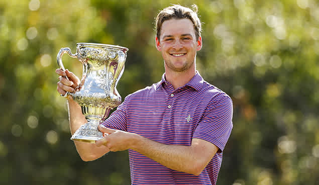 Lukas Michel proudly displays his first American championship trophy. Picture: USGA