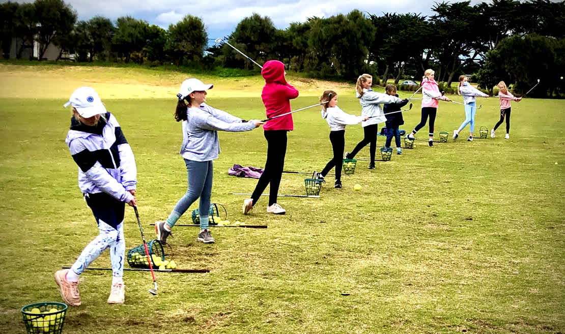 The girls get their MyGolf on at 13th Beach.