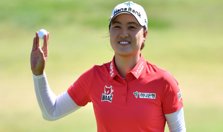 Minjee Lee holds the ball aloft after a birdie during the final round in Arkansas.