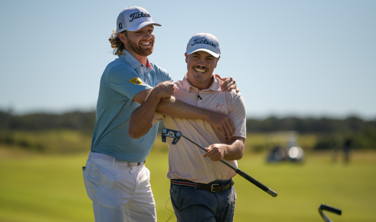 Blake Windred celebrating with his caddie and good friend Jack Poutney.