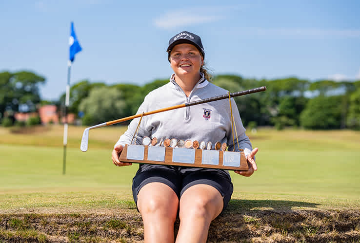 Kirsten Rudgeley proudly holds the Helen Holm Scottish Women's Open trophy.