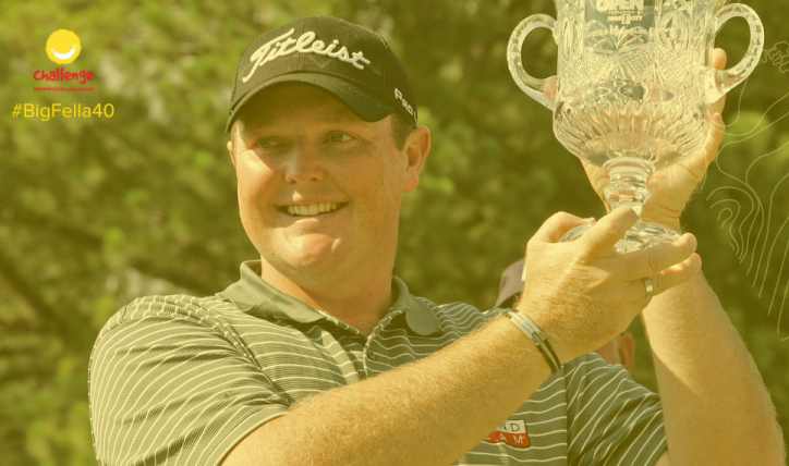 Jarrod Lyle holds a trophy aloft.