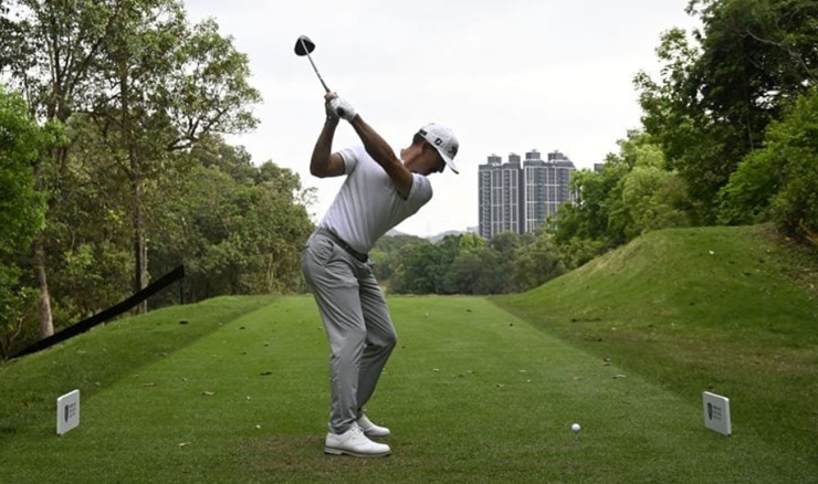 Wade Ormsby teeing off in Hong Kong.