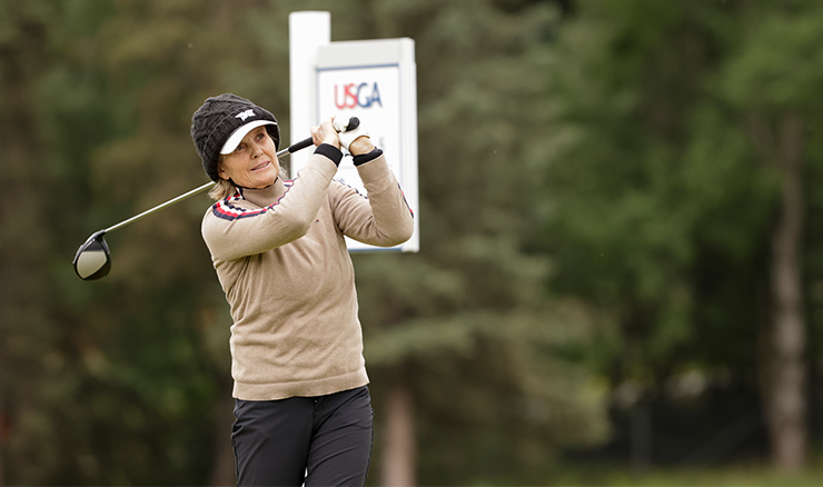 Sue Wooster tees off on the fifth hole during her round of 16 against Suzi Spotleson at the 2022 U.S. Senior Women's Amateur at Anchorage Golf Course in Anchorage, Alaska. Photo: USGA.
