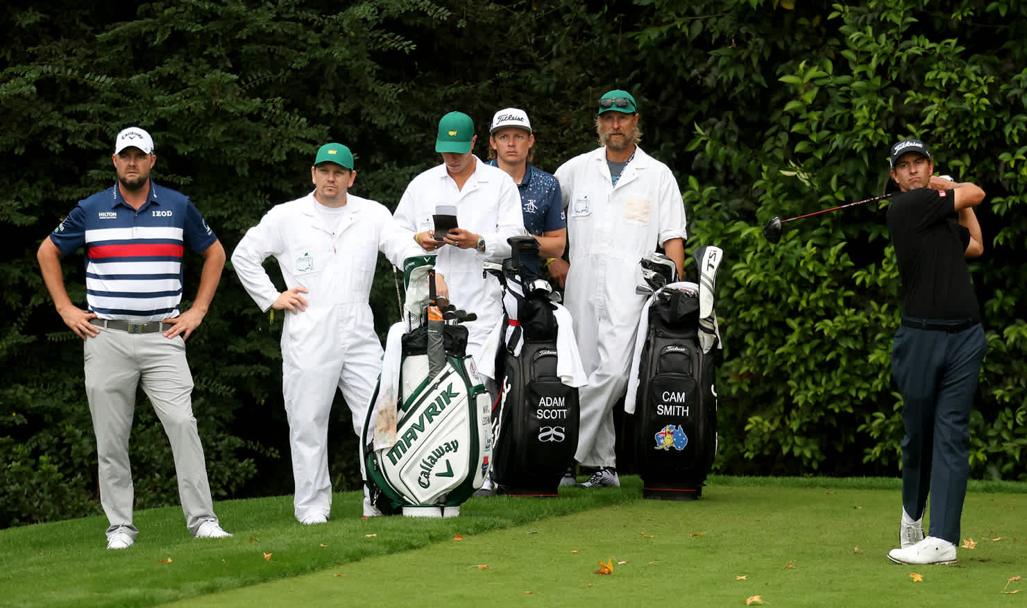 Aussies Marc Leishman, Cam Smith, Adam Scott and their caddies practise at Augusta this week.