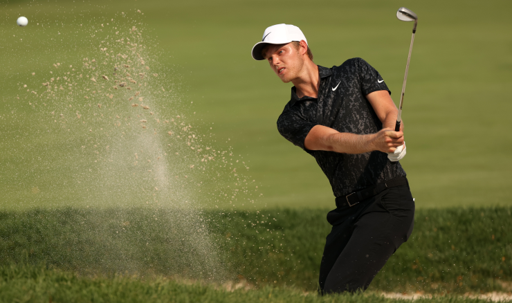 Cam Davis bunker shot during the final round of win at the Rocket Mortgage Classic.