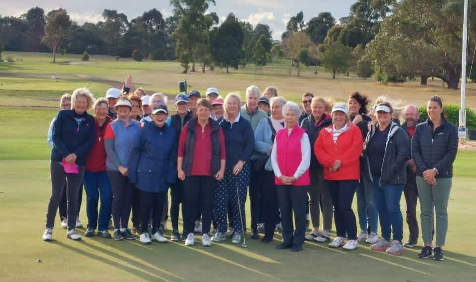 Ath Archer and Beth Francis with the current group of Hamilton beginner golfers.