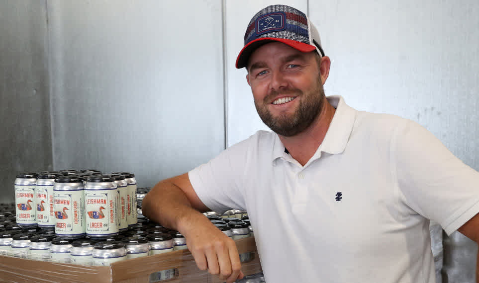 Marc Leishman with his own Leishman Lager.