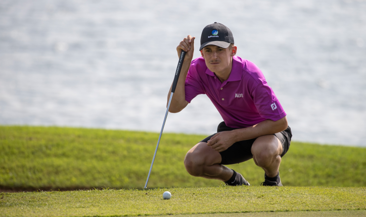 Connor McKinney lines up a putt on the 18th green in the second round of the Asia-Pacific Amateur Championship.