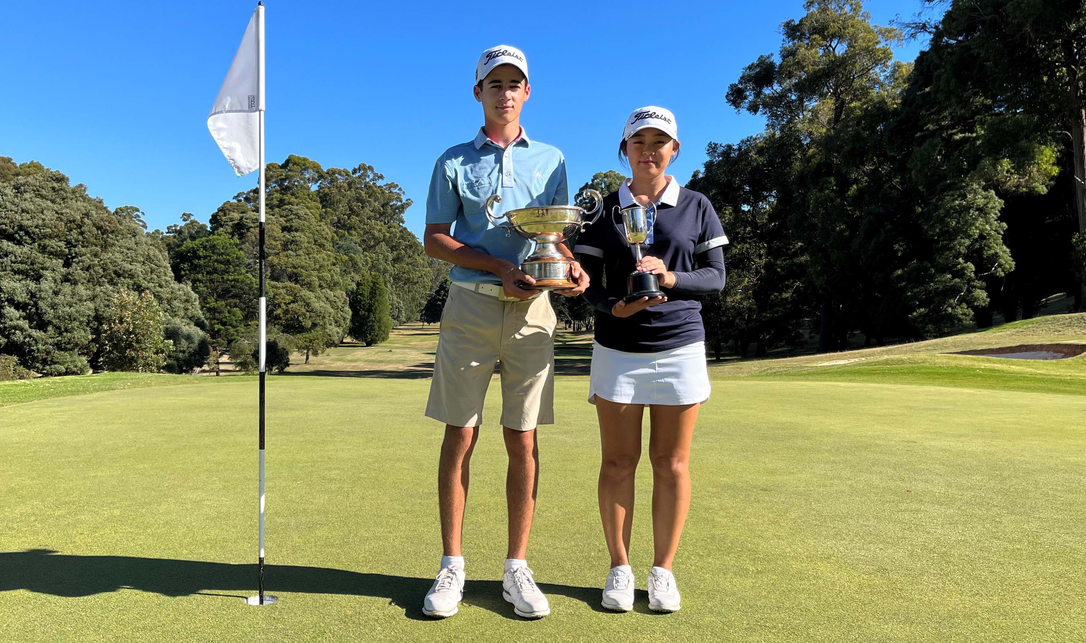 Joseph Buttress and Haruhi Nakatani with their Tasmanian Junior Masters trophies.