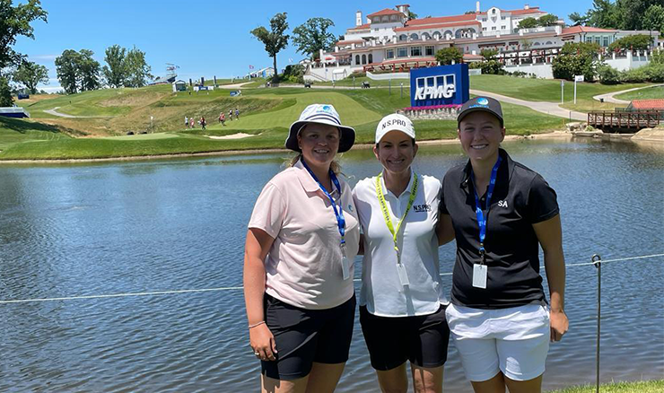 Kirsten Rudgeley, Karrie Webb and Caitlin Peirce in front of the picturesque clubhouse at Congressional Country Club.