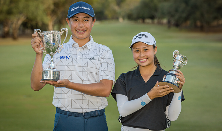 Jeffrey Guan and Jeneath Wong with their trophies.