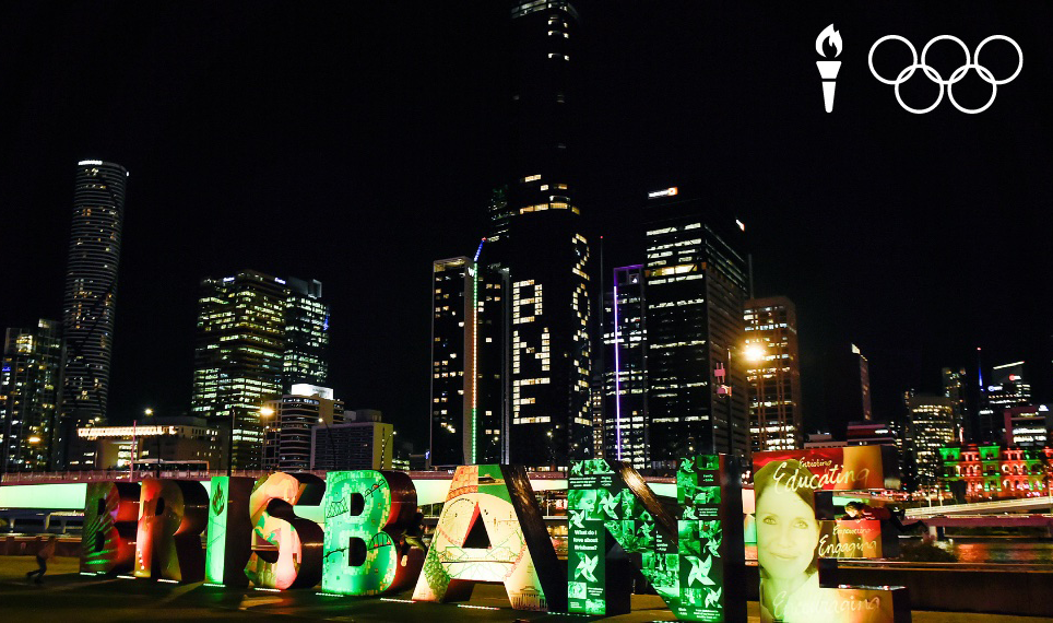 Brisbane 2032 sign lights up in front of the city.