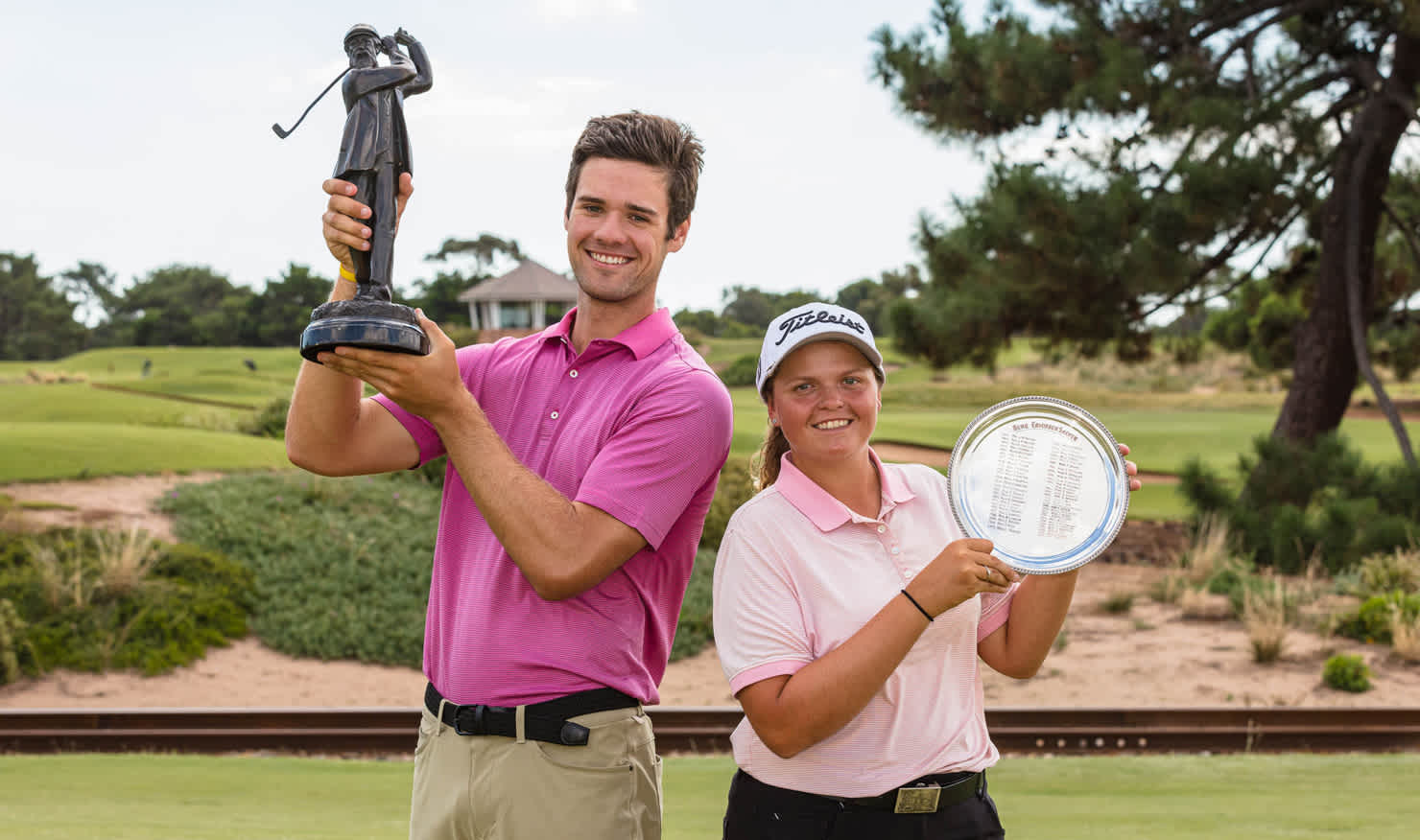 Harry Bolton and Kirsten Rudgeley show off their trophies at Royal Adelaide. Picture: DAVID BRAND