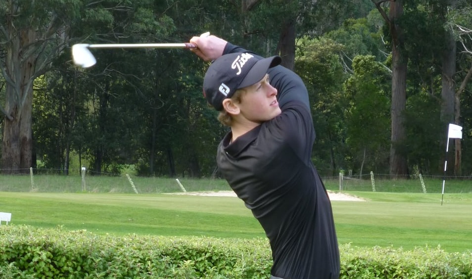 Oscar Burrell tees off during the RHL Roberts Trophy