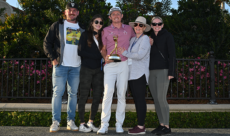 Cameron Smith with his family, his best friend Jack Wilkocz and THE PLAYERS Championship trophy.