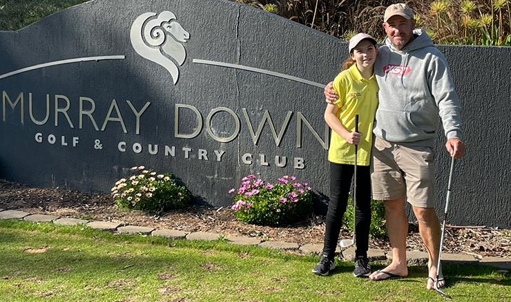 Charlotte with her father at Murray Downs Golf & Country Club.