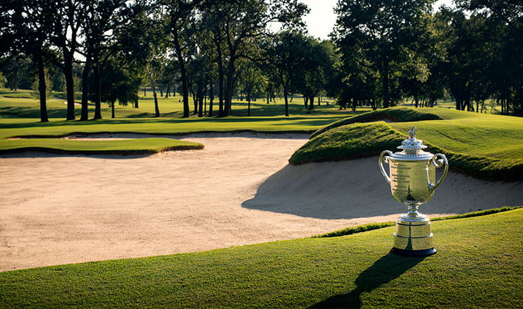 The Wanamaker trophy basks in sunlight on the 13th hole at Southern Hills Country Club.