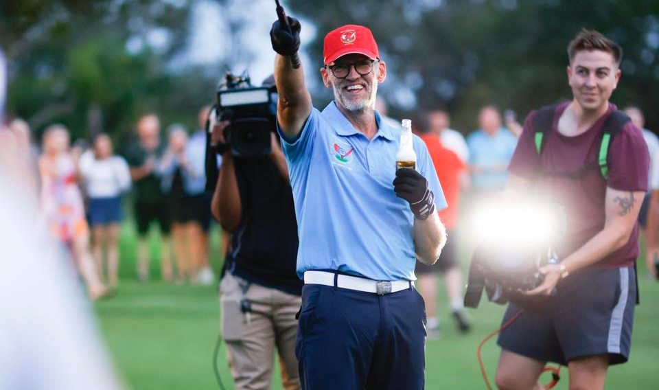 Mick McLoughlin celebrates after breaking the world record at Wynnum Golf Club.