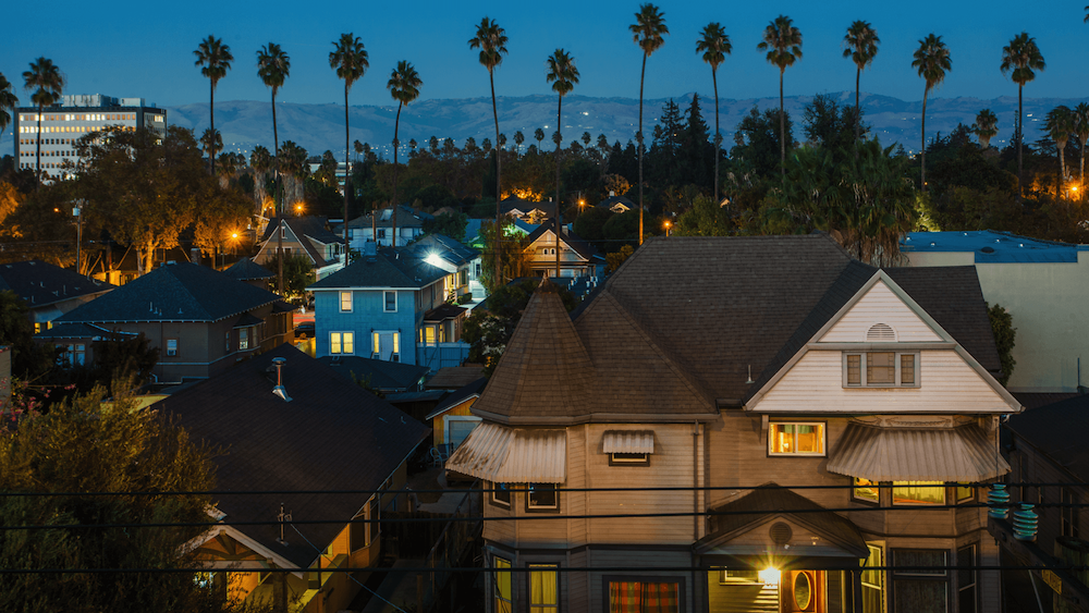 Photograph of houses and palm trees in California