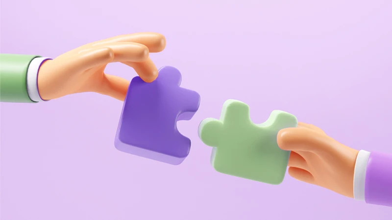 Illustration of two hands connecting puzzle pieces 