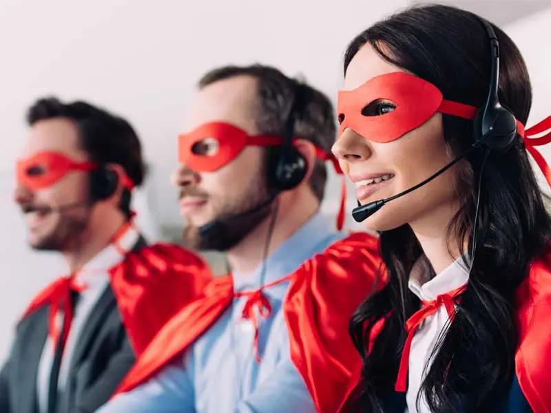 contact center agents wearing superhero masks