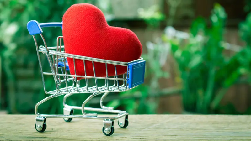 red heart in a mini shopping cart