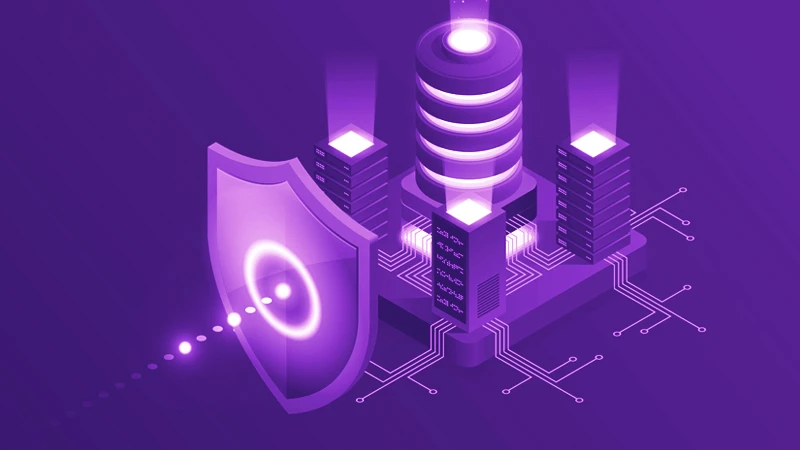 Illustration of a shield protecting computer technology, meant to symbolize cybersecurity