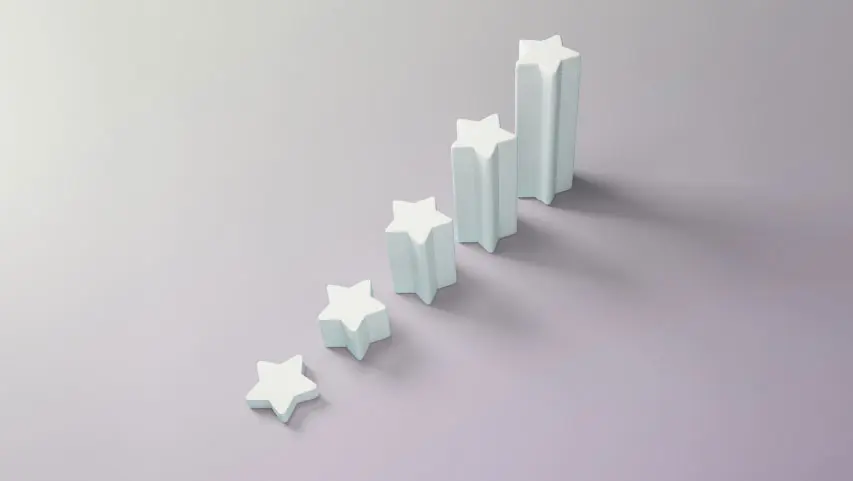 3D renderings of five stars in a line get progressively taller. 