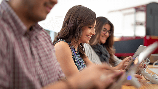 People playing with tablets