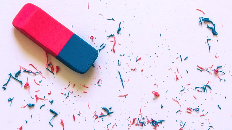 Eraser with shavings on a white background